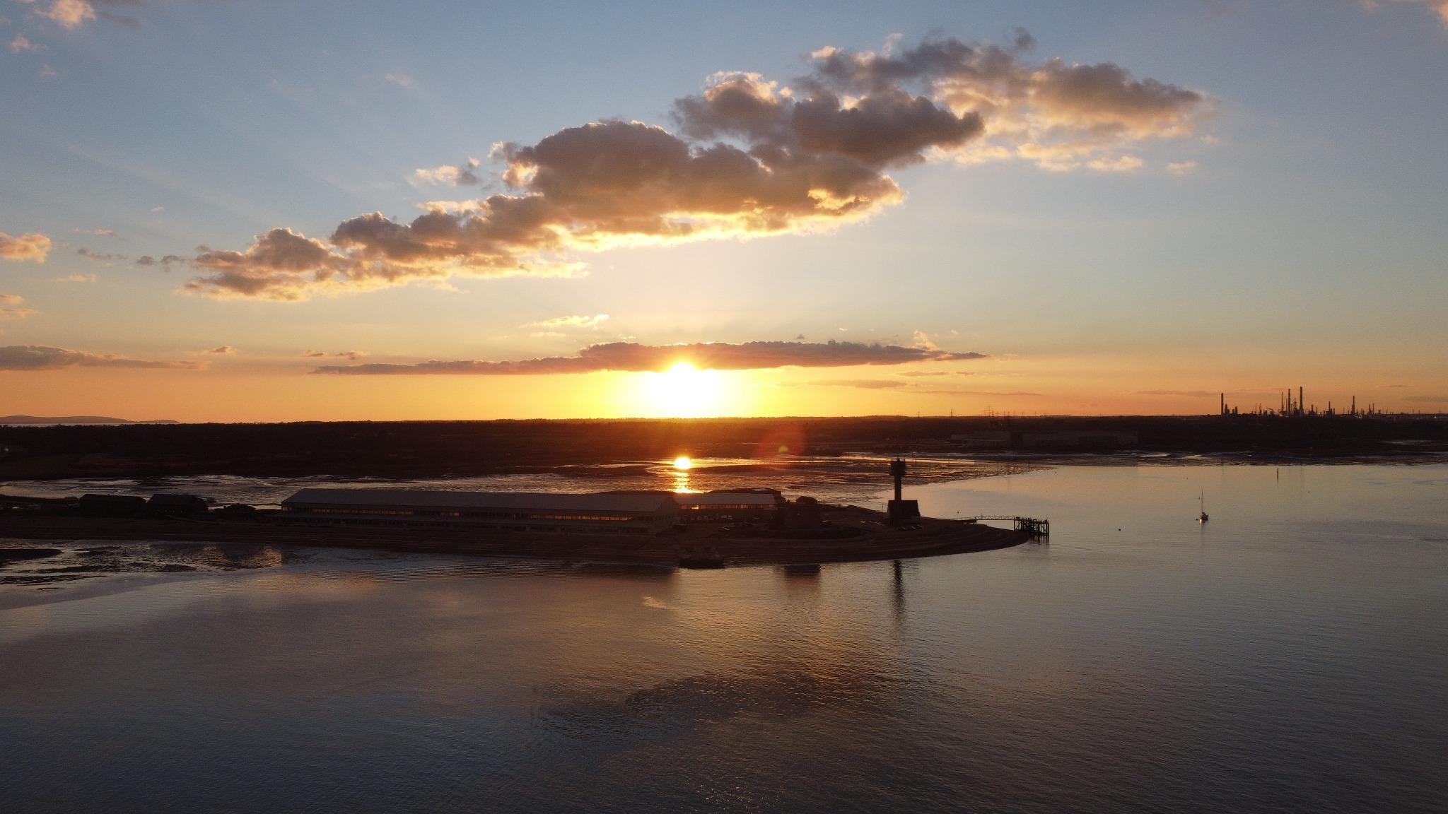 Sunset reflected across sheltered coastal water